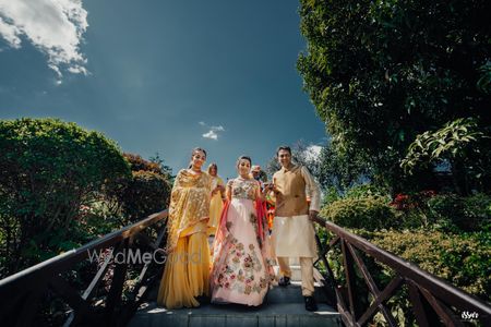 Photo of Mehendi bridal entry portrait with family