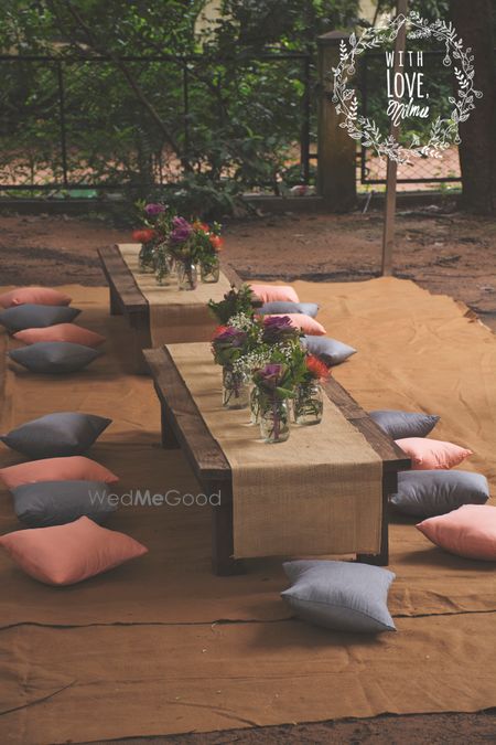 Photo of A floor seating arrangement for the mehndi with a Moroccon setting