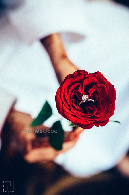 Photo of Engagement Diamond Ring on a Rose Shot