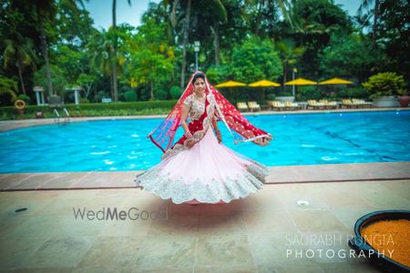 Photo of Twirling Baby Pink Lehenga Shot