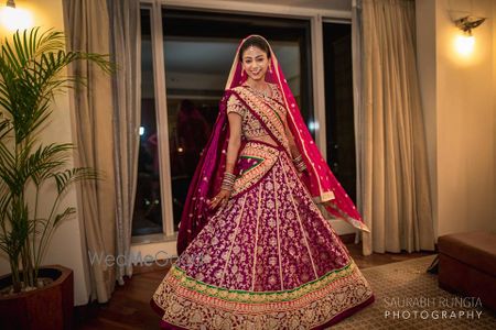 Photo of Wine Bridal Twirling Lehenga Shot