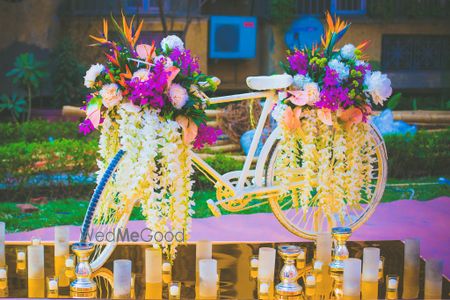 Photo of Gold Bicycle with Floral Decor