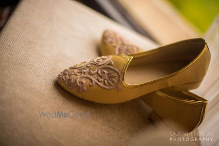 Photo of Gold Juttis with Zari Work