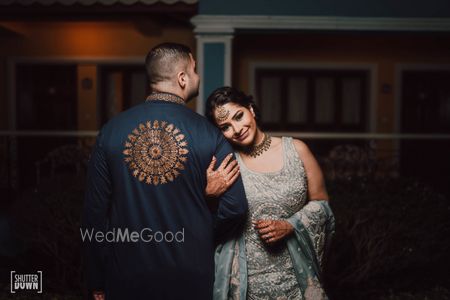 Photo of romantic couple pose idea on sangeet