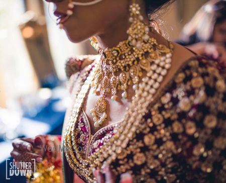 Photo of bridal necklace layering with shorter and rani haar