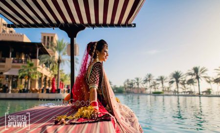 Photo of wedding day bridal portrait before entry on boat