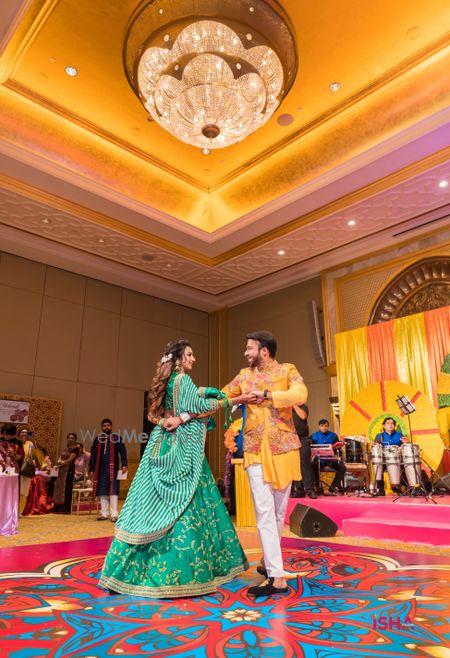 Photo of dancing couple on printed dance floor