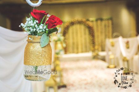 Photo of Gold Mason Jars Decor with Roses