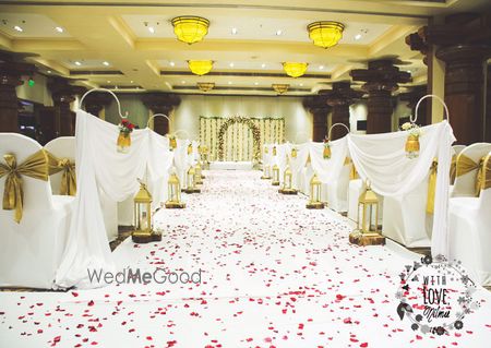 Photo of White Entrance with Flower Petals Decor