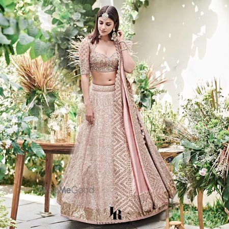 Photo of pastel pink engagement lehenga with modern look by jayanti reddy