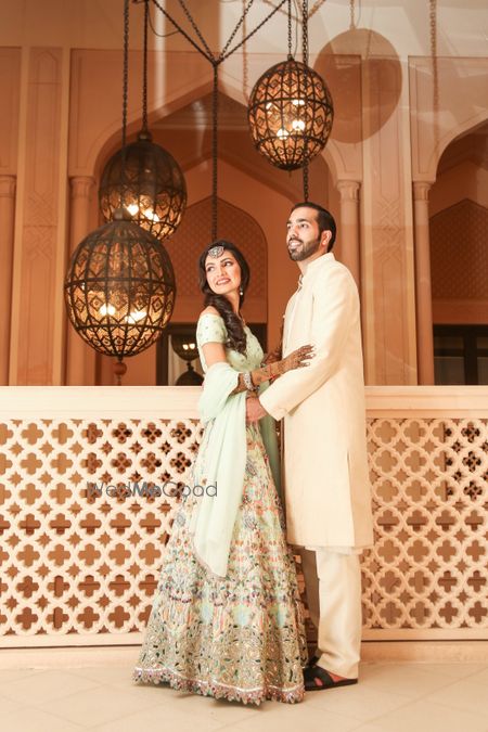 Photo of Fort couple portrait with pastel lehenga