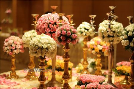 Photo of White Floral Table Centerpiece with Candelabras