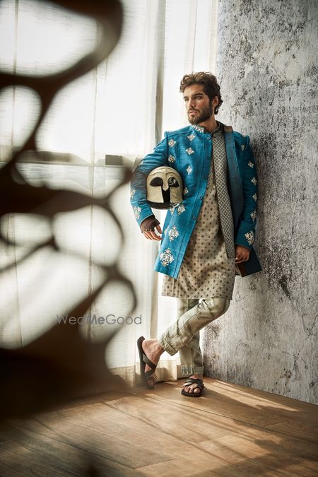 Photo of A smart and unique groom wear in blue and white!