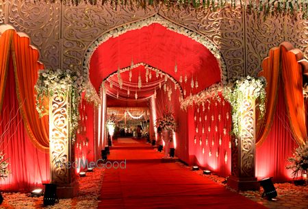 Photo of Red Themed Mandap with Floral Decor