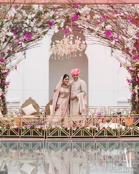 Photo of A happy couple smiling and posing on their wedding day