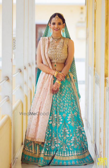 Photo of Bride in Light Blue Lehenga with Gota Work and Satlada