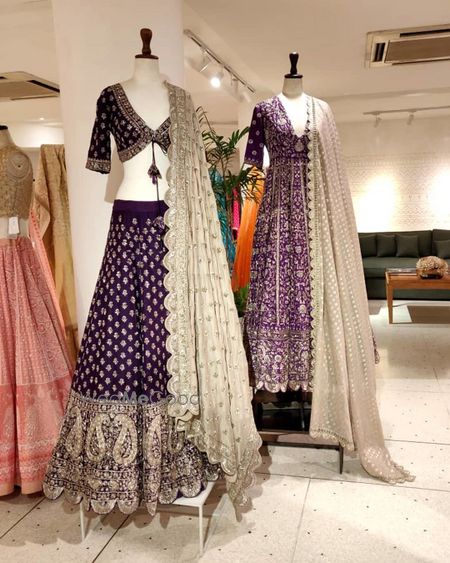 Photo of A bright purple lehenga and a bright purple anarkali  iwth silver detailing