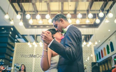 Photo of Christian wedding couple dancing portrait