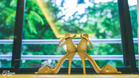 Photo of Wedding heels against window