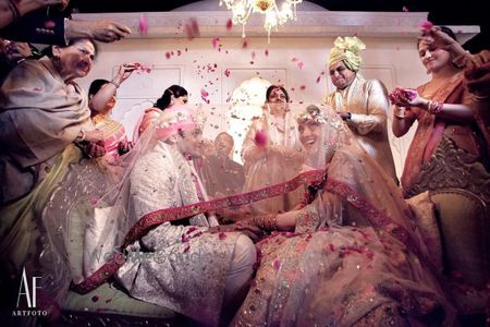 Photo of A candid shot of the couple captured during the wedding ceremony