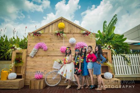 Photo of Fun photobooth backdrop with bridesmaids