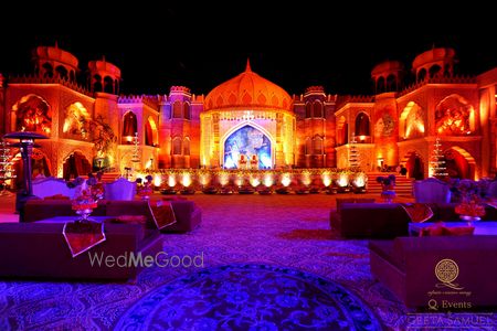 Photo of Royal Gold Theme Decor with Purple Seating