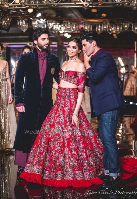 Photo of Deep Red Lehenga with Silver Embroidery and Thread Work