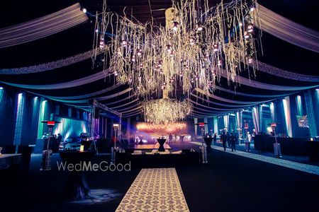 Photo of glamorous club look theme with large chandeliers