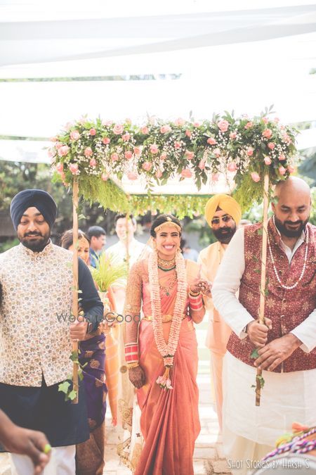 Photo of South Indian bride entering under phoolon ki chadar