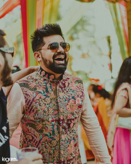 Photo of Groom wearing a textured nehru jacket with kurta pyjama.