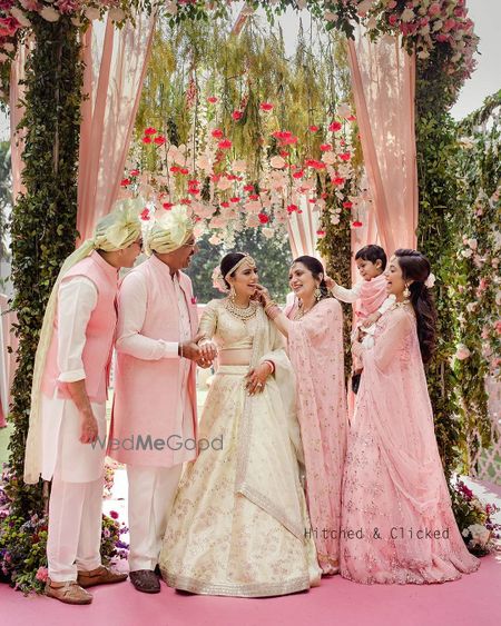 Photo of Candid shot between bride and her family