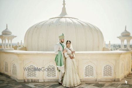 Photo of Gorgeous couple in white on wedding day