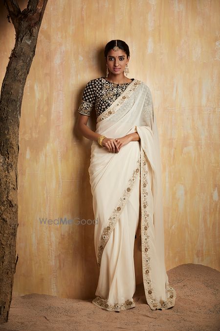 Photo of White saree with black blouse