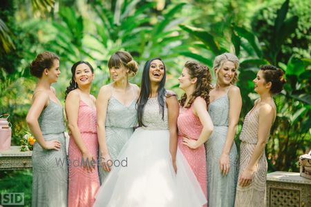 Photo of Bride with Bridesmaids in Pastel Colours