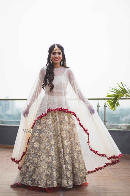 Photo of Floral applique lehenga in white