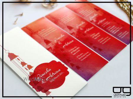 Photo of red and white wedding card