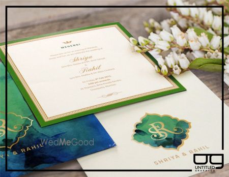 Photo of green and gold mehendi invite