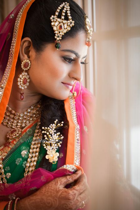 Photo of Bride wearing jhoomer